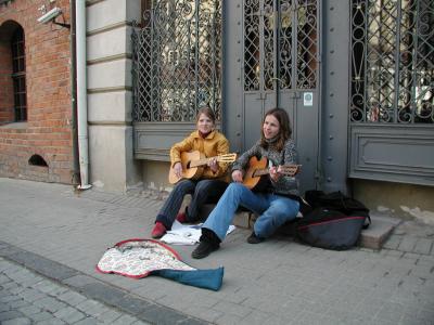 Pilies Street attracts many aspiring musicians.  They add a casual, festive atmosphere to the area. 